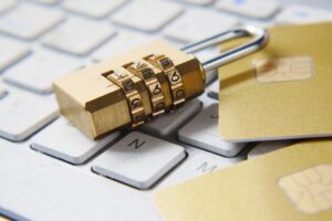 Padlock on a computer keyboard representing online account security