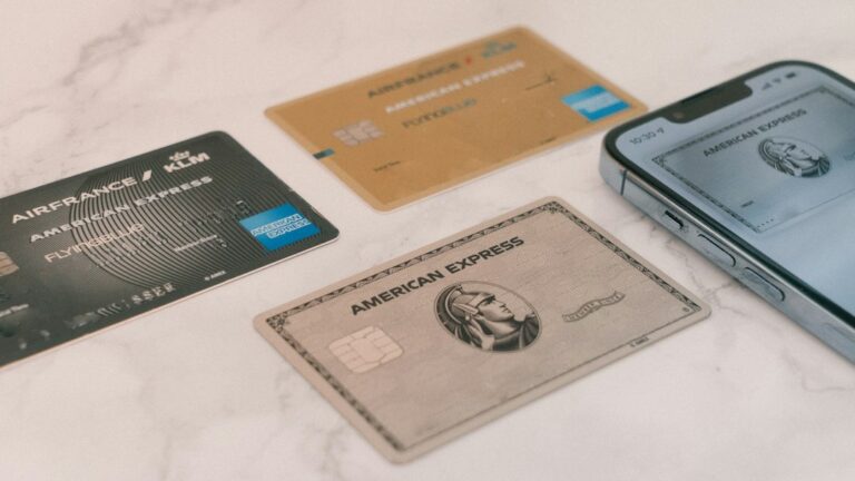 Credit cards beside a smartphone representing credit and identity protection